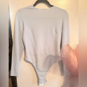New with tags women’s long sleeve body suit size 8  medium